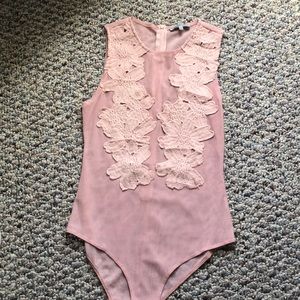 Mesh body suit with flower patches